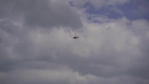 Military helicopter flies in the sky. Video stock 210292853