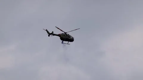 A military helicopter pilot demonstrates the technical skills Stock Footage 287003958