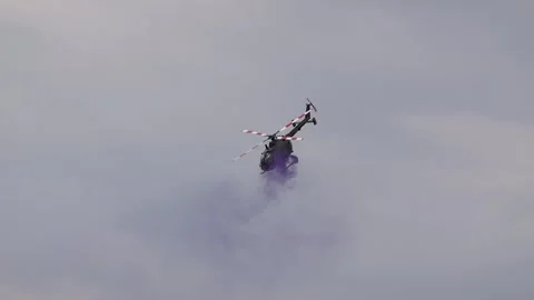 A military helicopter pilot demonstrates the technical skills Stock Footage 287006506