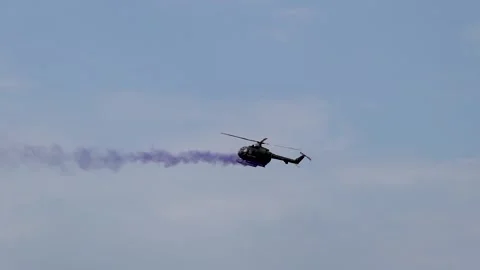 A military helicopter pilot demonstrates the technical skills Stock Footage 287007686