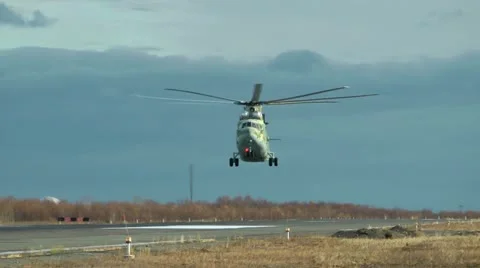 Military helicopter pilots learn to operate the big MI-26 helicopter Stock Footage 12700921