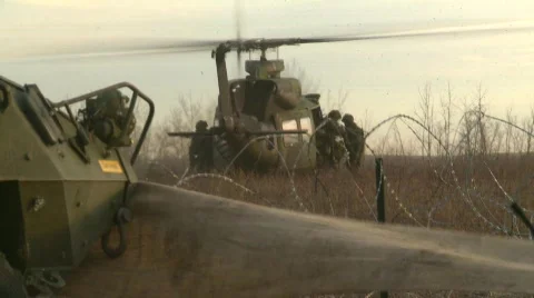 Military, Helicopter, soldiers disembarking Stock Footage