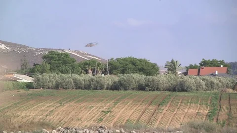 Military helicopter taking off Stock Footage 76917437