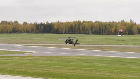 A military helicopter is taking off Stock-Footage 290519682