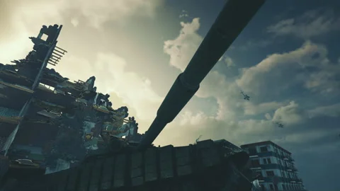 Military helicopters over the destroyed city of Ukraine. War between Russia and Vidéo 172303637