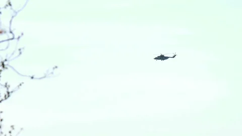 Military helicopters return from a fighting task Video stock 105817816