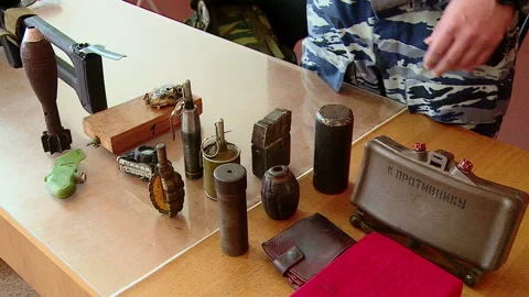 Military instructor sapper shows the device mines, grenades, explosives Stock Footage 89131360