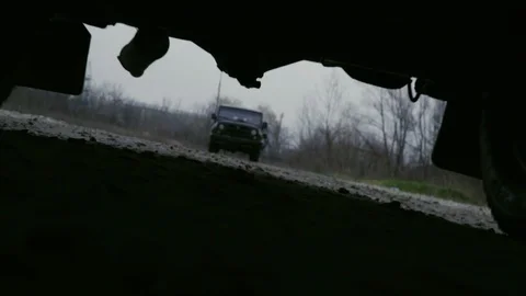 Military jeep in the road Stock-Footage 129757352