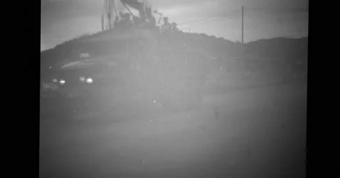 Military jeeps and trucks with Chinese prisoners moving on highway Stock Footage