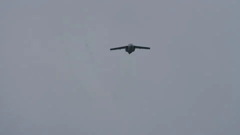Military jet plane ascends vertically to perform an aerobatic maneuver Stock Footage 159751893