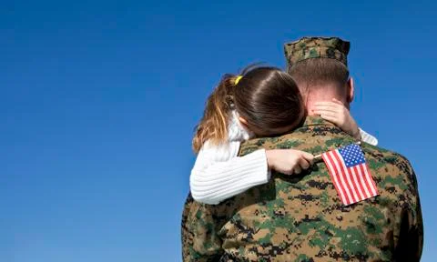 Military Man Hugs Daughter Stock Photos
