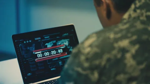 Military man looking at countdown on computer, reconnaissance satellite launch Stock Footage 264326899