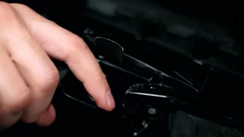 Military man pulls the trigger of a machine gun. Stock Footage 144070920