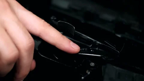 Military man pulls the trigger of a machine gun. Close-up 動画素材 154002108