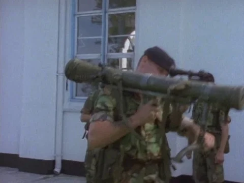 Military men receiving training with rocket launcher Stock Footage 79877532