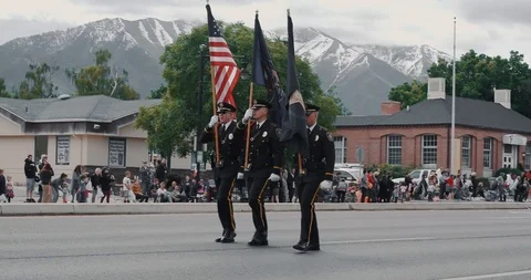 Military men walking with flags during parade Stock-Footage 127464558