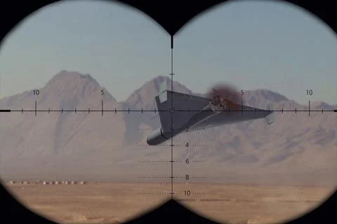 Military observer tracks an attack drone through binocular targeting optics.. Foto stock