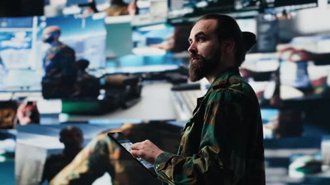 Military officer engaged in tactical command and surveillance activity Stock Footage 311082632