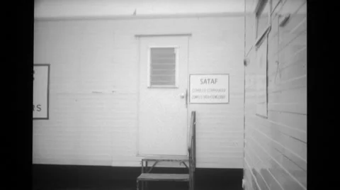 Military officer entering SATAF Headquarters room Stock Footage
