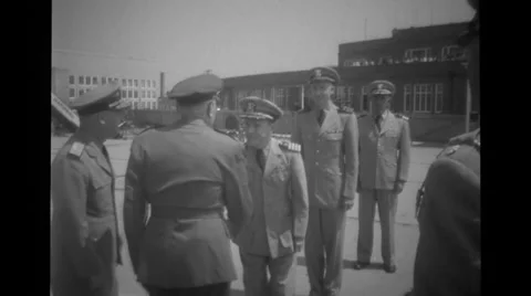 Military officer shaking hands at airport Stock Footage