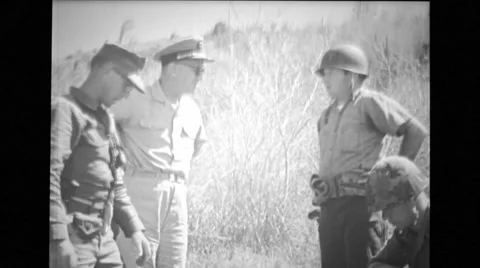 Military officer talking to soldier during training Stock Footage