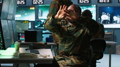 Military officer using augmented reality tracking tech to gain intel Video stock 282058888
