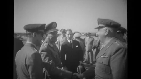 Military officers shaking hands at airport Stock Footage