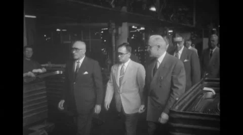 Military officers touring automotive plant Stock Footage