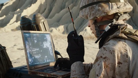 Military Operation in the Desert, Using Satellite or Drone Technology: Soldier Stock Footage 100628875
