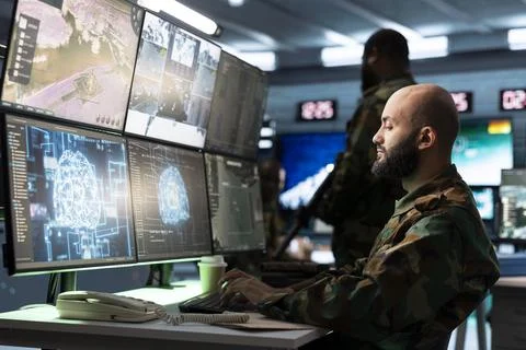 Military operator using AI technology for planning and decision making Stock Photos