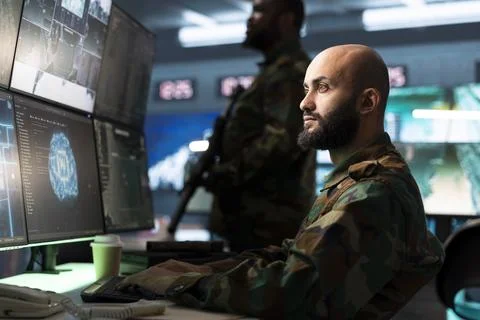 Military operator using AI technology for planning and decision making Stock Photos