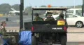 Military Personnel In Golf Cart HD Footage