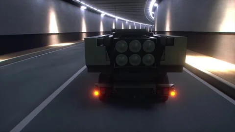 Military Rocket Artillery System Transported Through Tunnel in Convoy. Stock Footage 335967307
