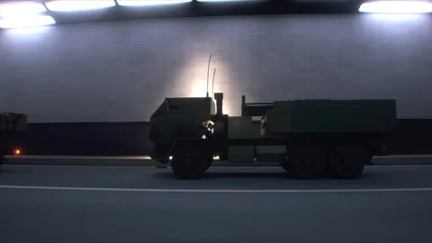 Military Rocket Artillery System Transported Through Tunnel in Convoy. Stock Footage 335967312