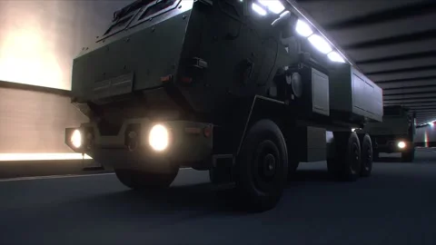 Military Rocket Artillery System Transported Through Tunnel in Convoy. Stock Footage 335967318