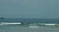 Military ship crossing near the beach HD Footage