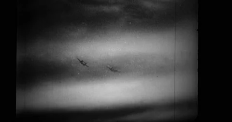 Military soldier firing from German fighter airplane Stock Footage