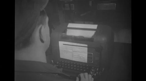 Military soldier operating typewriter Stock Footage 37593379