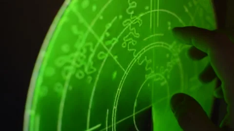 Military soldier using a war fly sonar radar on the control room. green radar. Stock-Footage 220843193