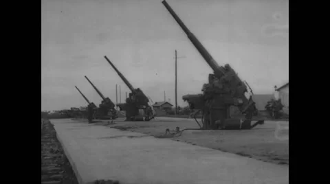 Military soldiers aiming anti-aircraft guns Stock Footage