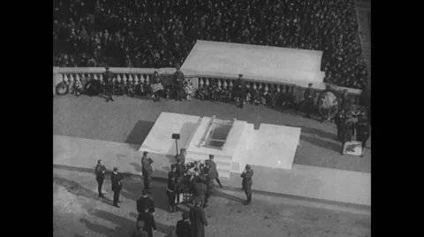 Military soldiers carrying flag draped coffin to stand Stock Footage