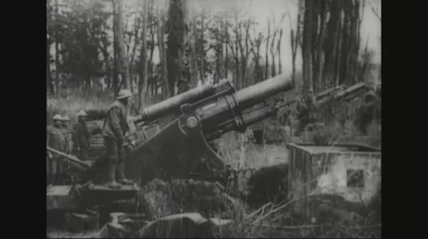 Military soldiers firing cannon Stock Footage