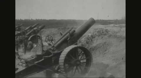 Military soldiers firing howitzer Stock Footage