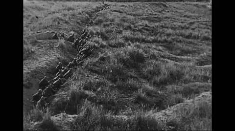 Military soldiers hiding in trench while in combat Stock Footage