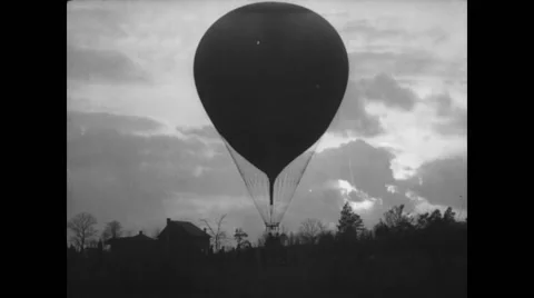 Military soldiers in hot air balloon Stock Footage