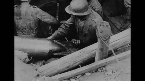 Military soldiers loading missile in cannon Stock Footage