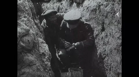 Military soldiers pushing plunger to detonate explosion in trench Stock Footage