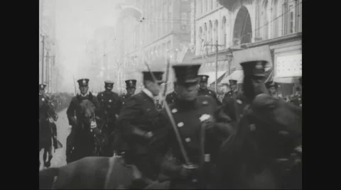 Military soldiers riding horses on street Stock Footage