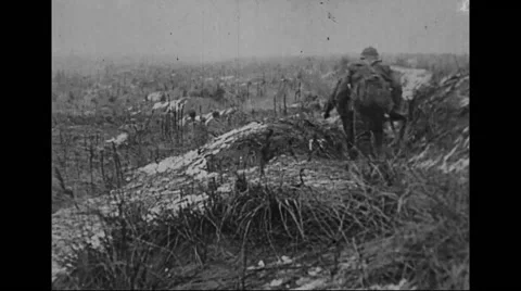 Military soldiers running in the field Stock Footage