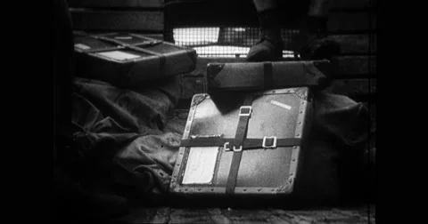 Military soldiers travelling with film reel in truck Stock Footage